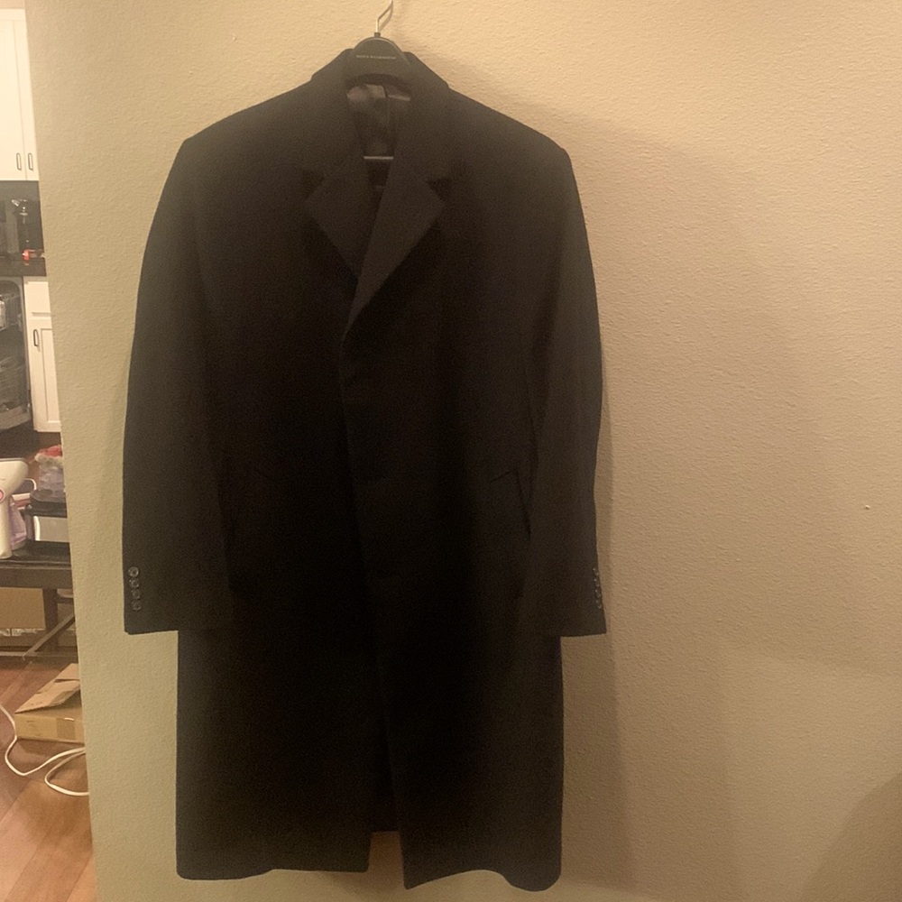 Black wool long jacket. Classic look . Excellent condition